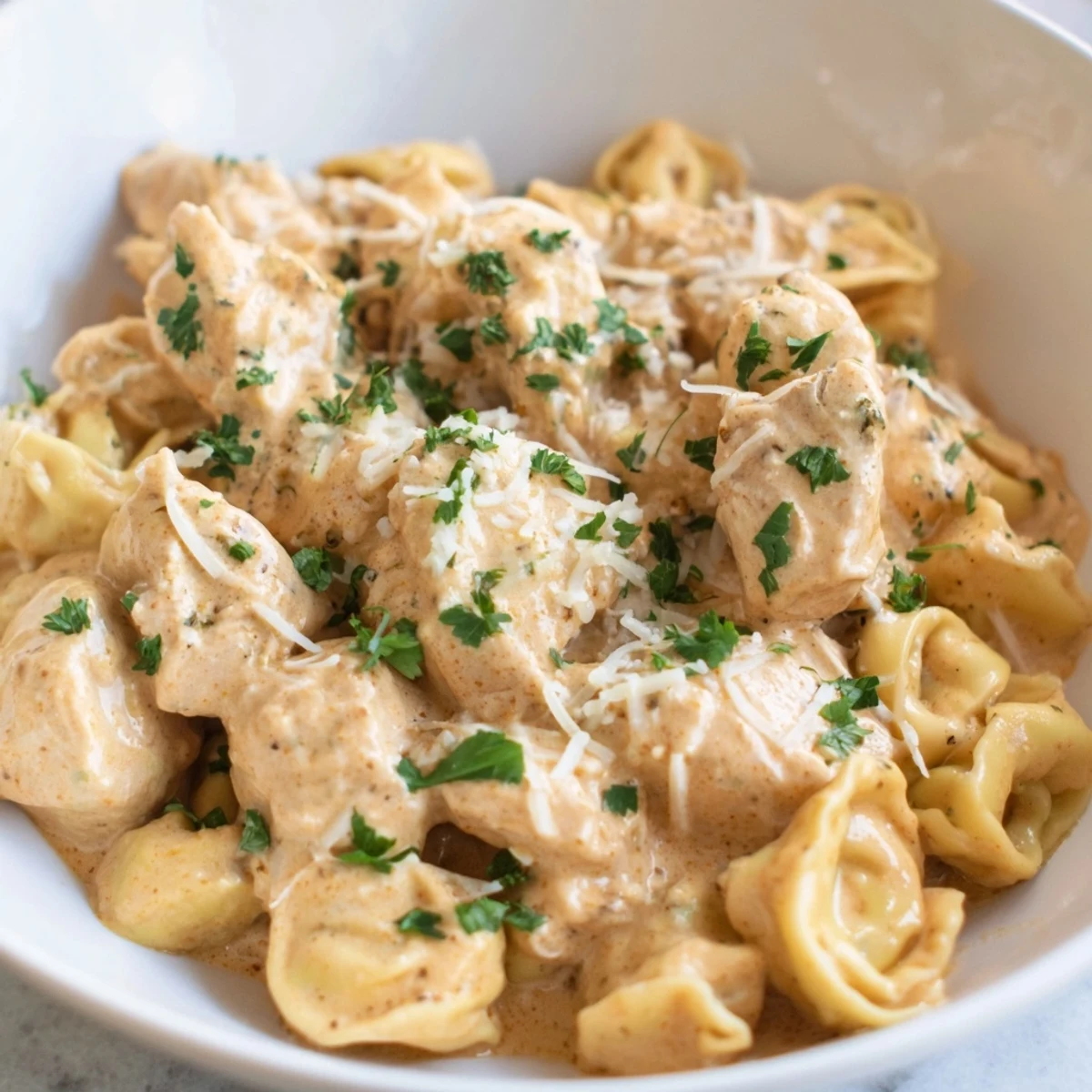 Imagine this: perfectly cooked Zesty Cajun Garlic Parmesan Chicken Tortellini, fragrant with spicy Cajun spices and garlic.