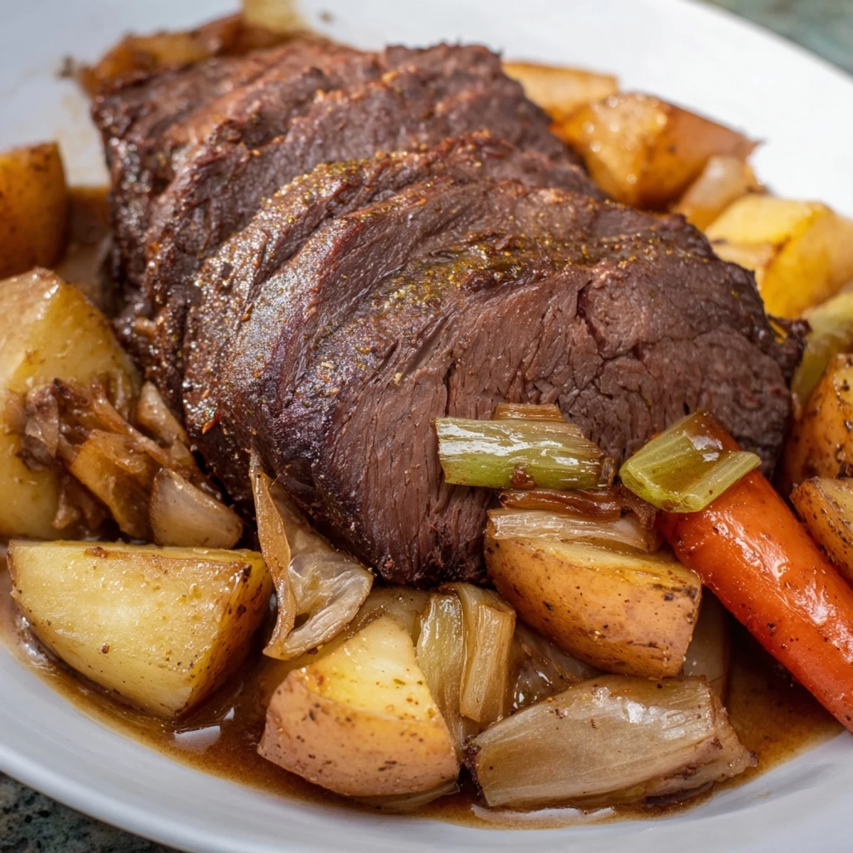 Tender Sunday Pot Roast with roasted vegetables, a hearty, savory meal perfect for a family feast.