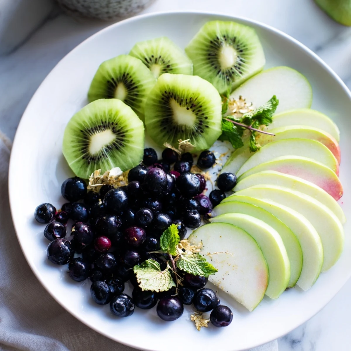 Fresh blackberries and grapes star in this stunning The Aurora Borealis Sweep appetizer, a colorful treat.