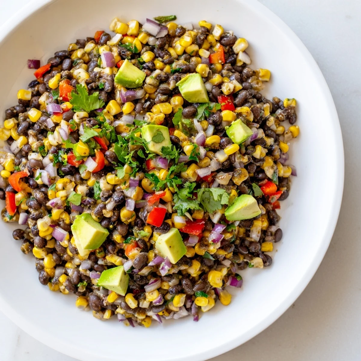 A colorful Southwestern black bean and corn salad, perfect for a fresh summer lunch or side dish.