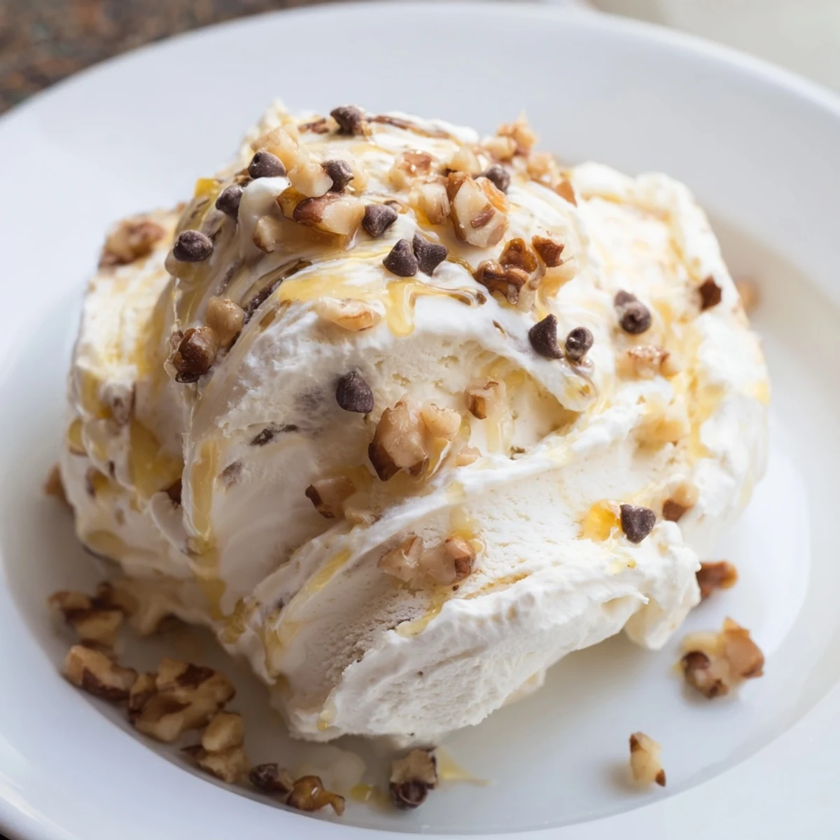 Creamy cottage cheese ice cream swirled with fresh berries, a delightful, protein-packed dessert.