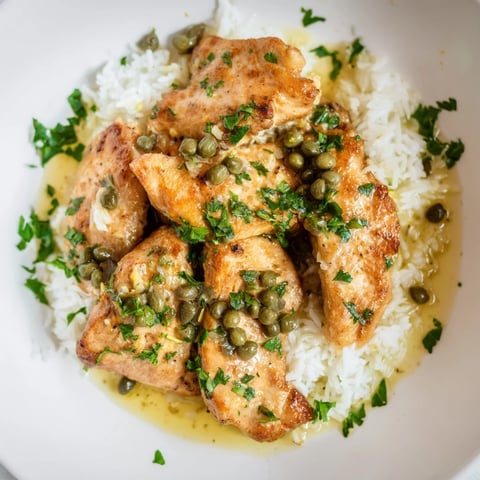 Express Chicken Piccata Rice Bowl, a delicious Italian-American dish with golden chicken and zesty lemon sauce.