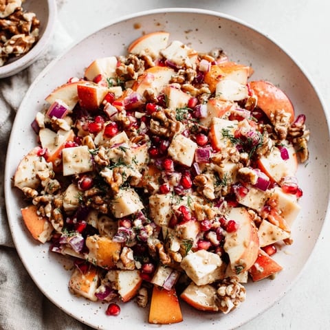 Vibrant Fall Harvest Apple and Chickpea Salad with crisp apples and a creamy dressing, ready to enjoy.
