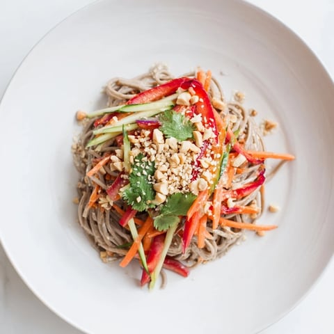 Cold Noodle Salad with Sesame-Ginger Dressing: Colorful Asian salad with chilled noodles and a vibrant dressing.