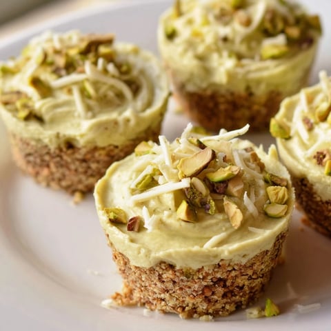 Golden and green, these Pistachio Cheesecake Bites are a delightful mini dessert, ready to enjoy.