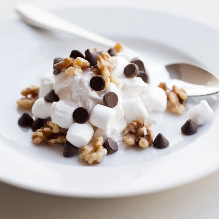 Sensuous close-up of a chocolate chips and mini marshmallows heap: a sweet, fast, American treat.
