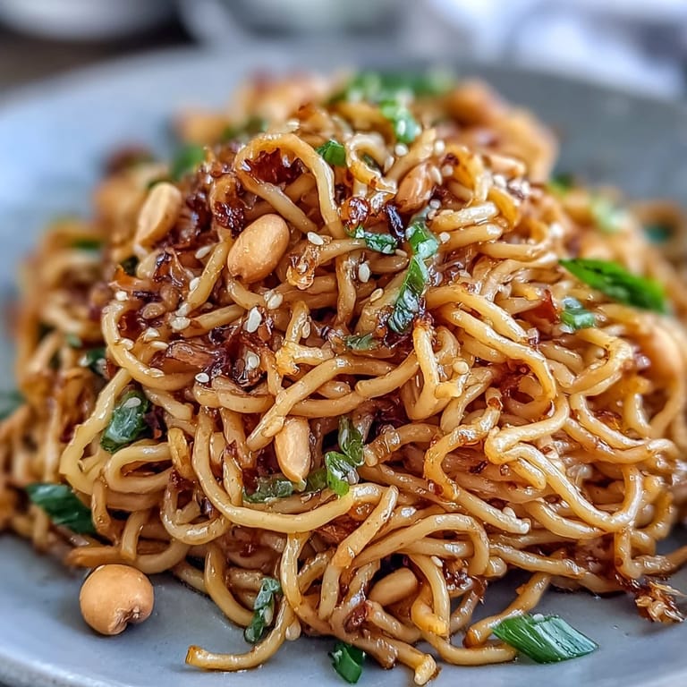 Spicy and savory Chili Crisp Noodles tossed with crunchy chili crisp and fresh scallions for bold Asian flavor.  
